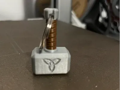 Imagem de referência: 48 minutes - Mjolnir - Thor Hammer Keychain