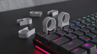 Imagem de referência do modelo 3D Ferramenta para remover teclas de teclado; foto ilustrativa, cores finais azul ou azul com verde.