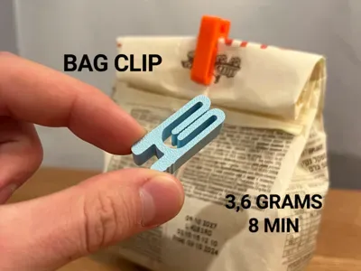 Imagem de referência do modelo 3D Mini clipe para sacos e pacotes; foto ilustrativa, cores finais azul ou azul com verde.